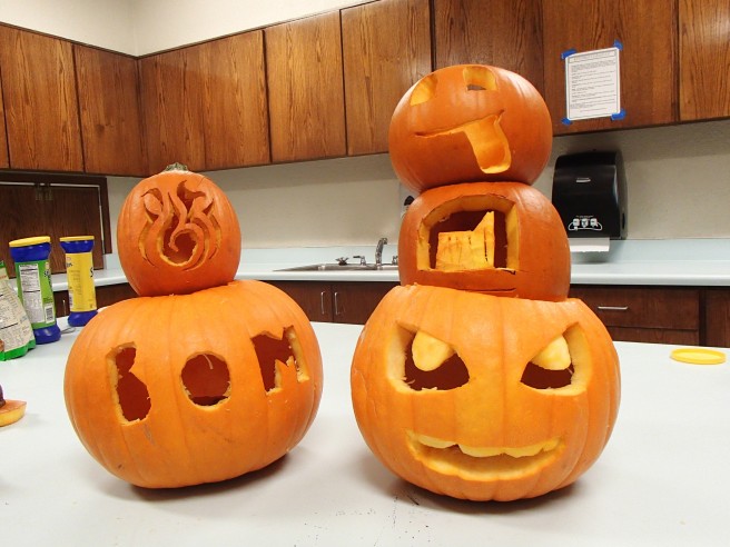 Our District's carved pumpkins... Mine is the silly face on the top right. Couldn't quite get the tongue shape right. :)